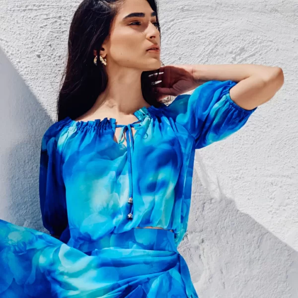 Φλοράλ αμάνικη πλισέ μπλούζα με δέσιμο στο λαιμό και βολάν