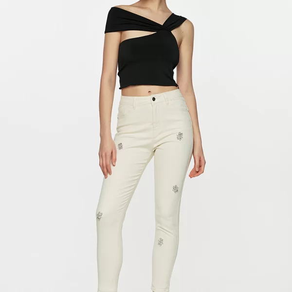 Cinderella Τζην παντελόνι βανίλια με λουλούδια απο στρας